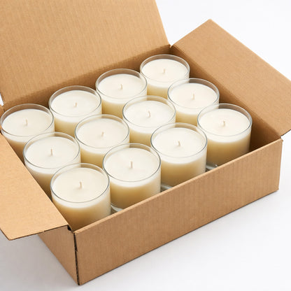 12 pack of 11oz tumbler candles in a brown packaging box. The box is open, showing the tops of all the candles. 