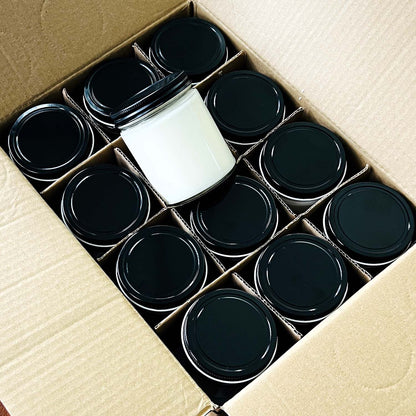Box of 12 9oz clear jar candles with lids. Shows what you will order from Candle Builders with a wholesale candle order. 