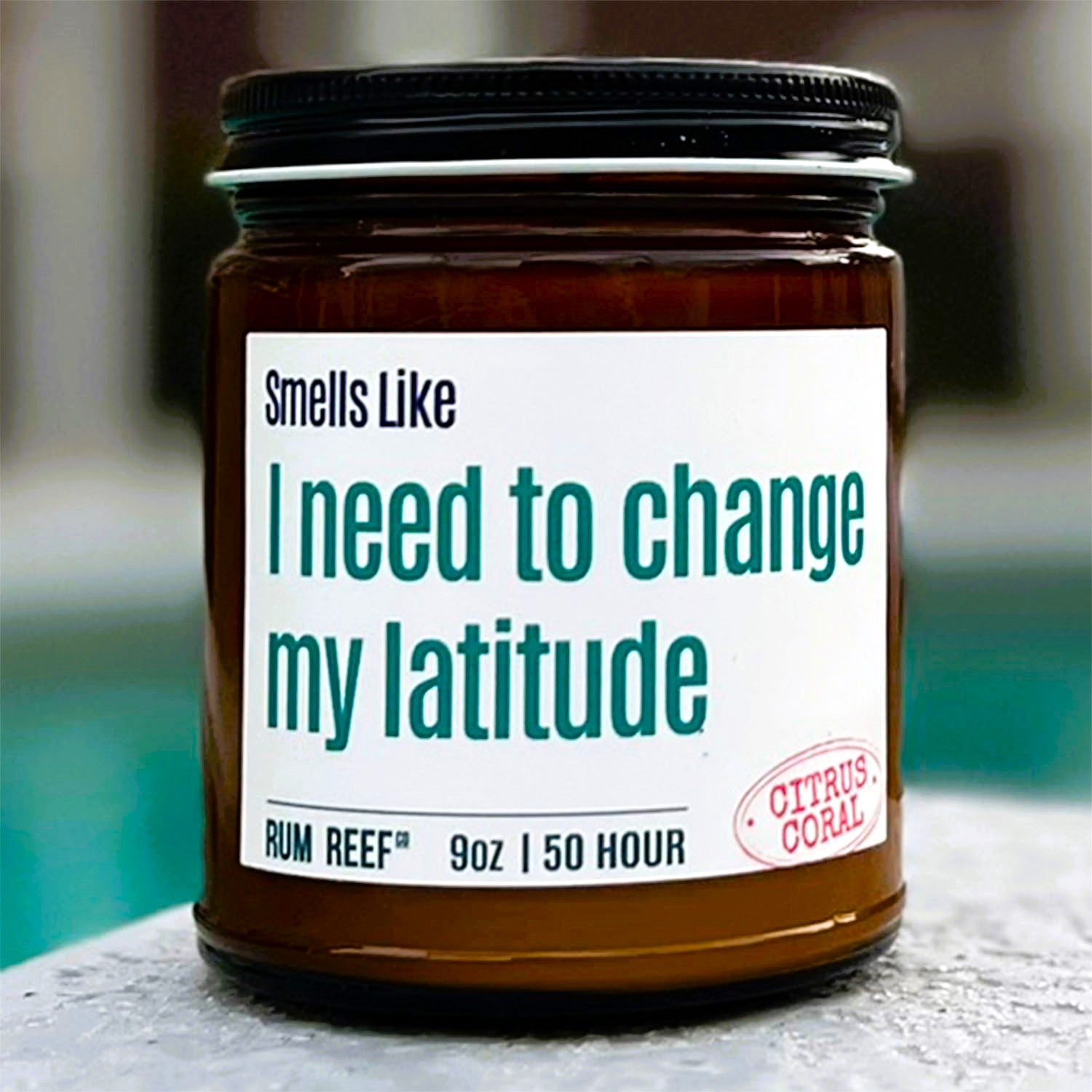 Jar of candle with humorous label on a blurred background