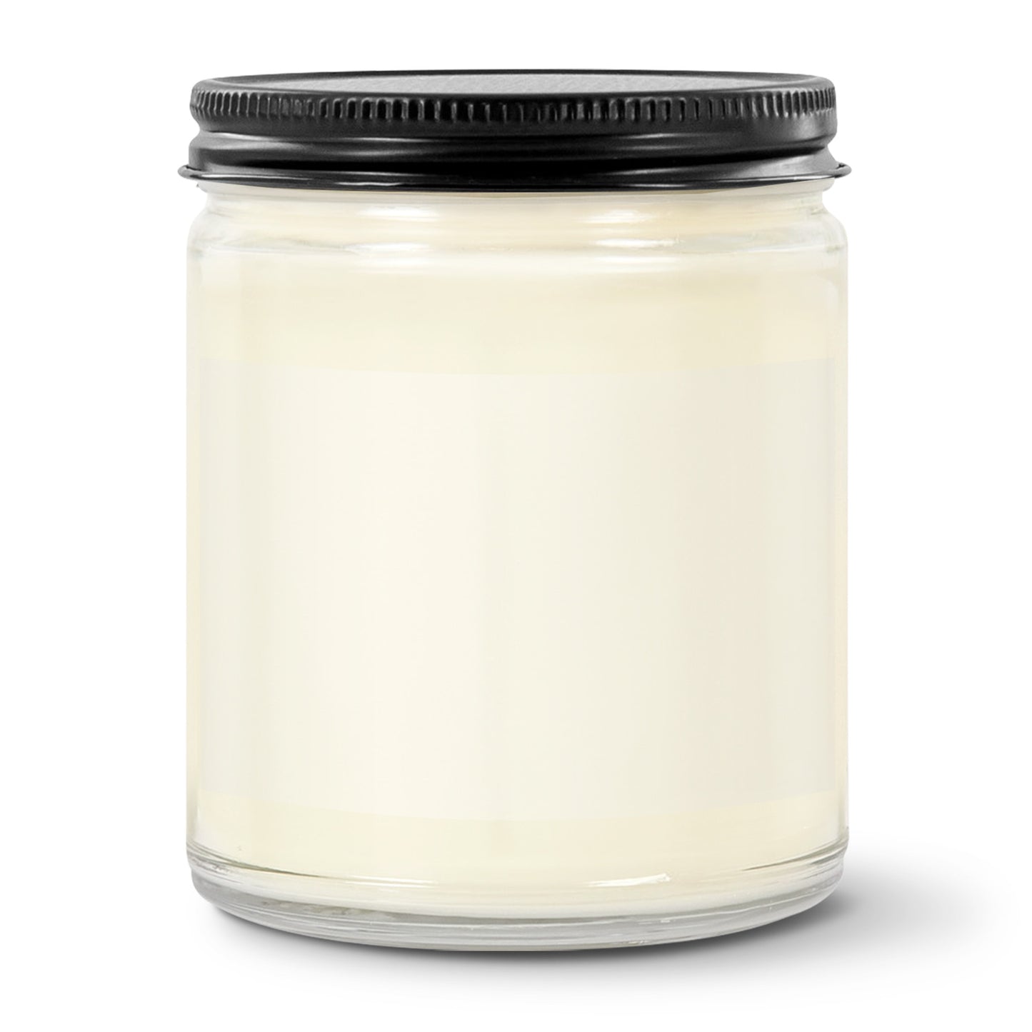 White candle in a glass jar with a black lid on a white background