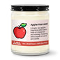 Candle with 'Apple Harvest' label and description on a white background